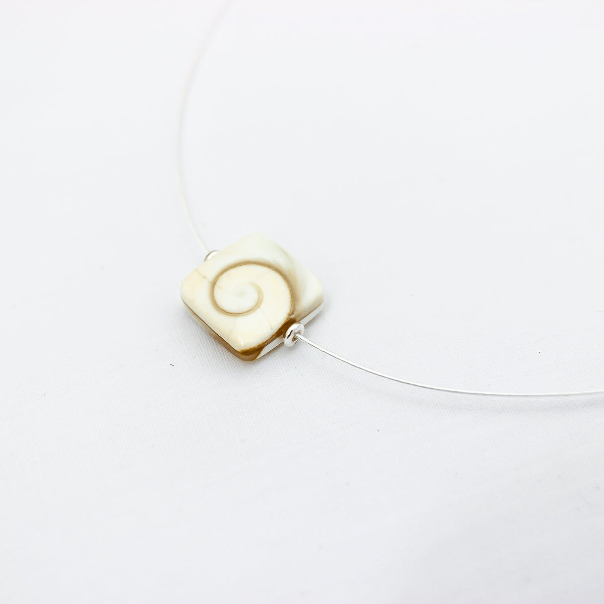 Sterling Silver Round Open Shell Pendant on Natural Cord